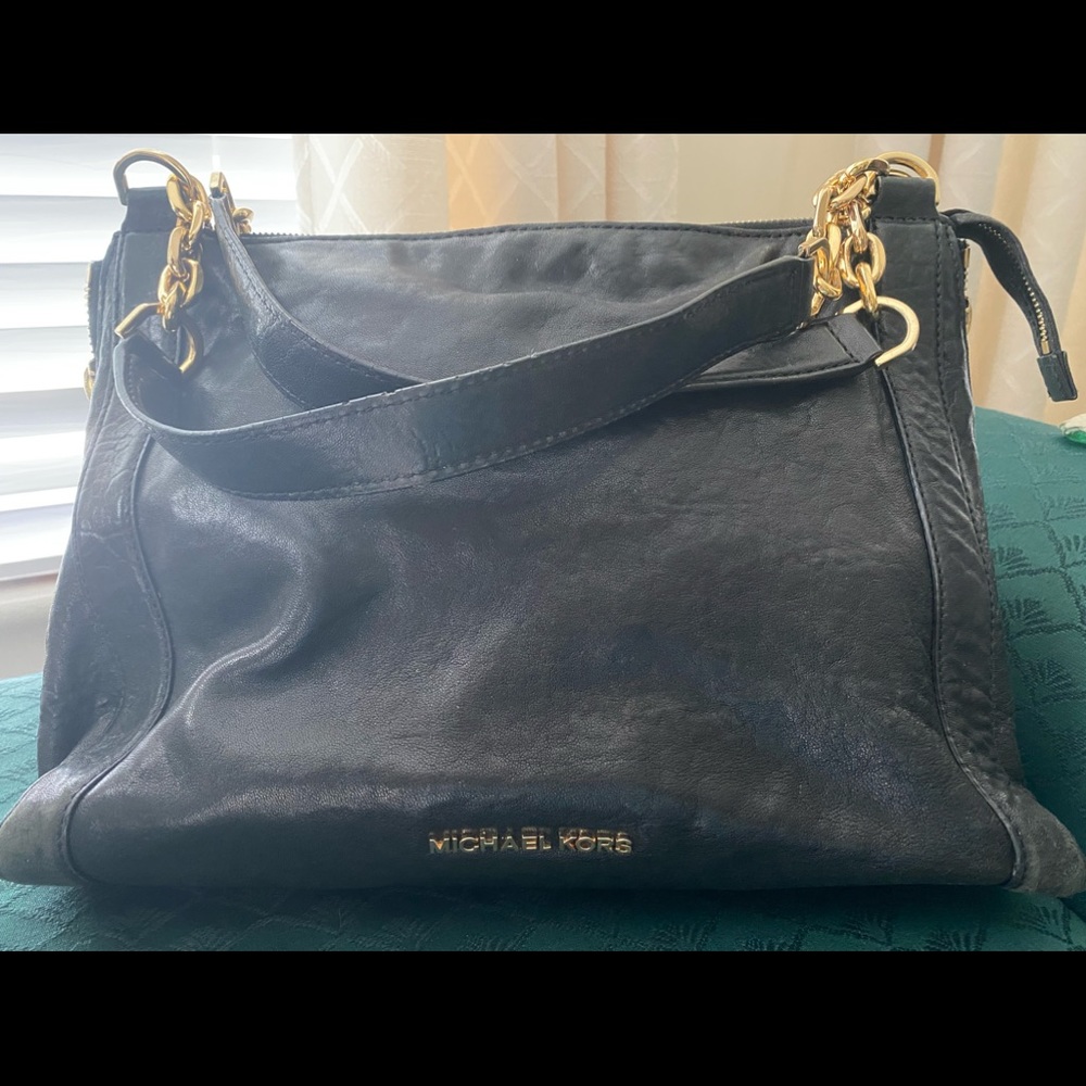 Michael Kors Leather bag with gold accessories